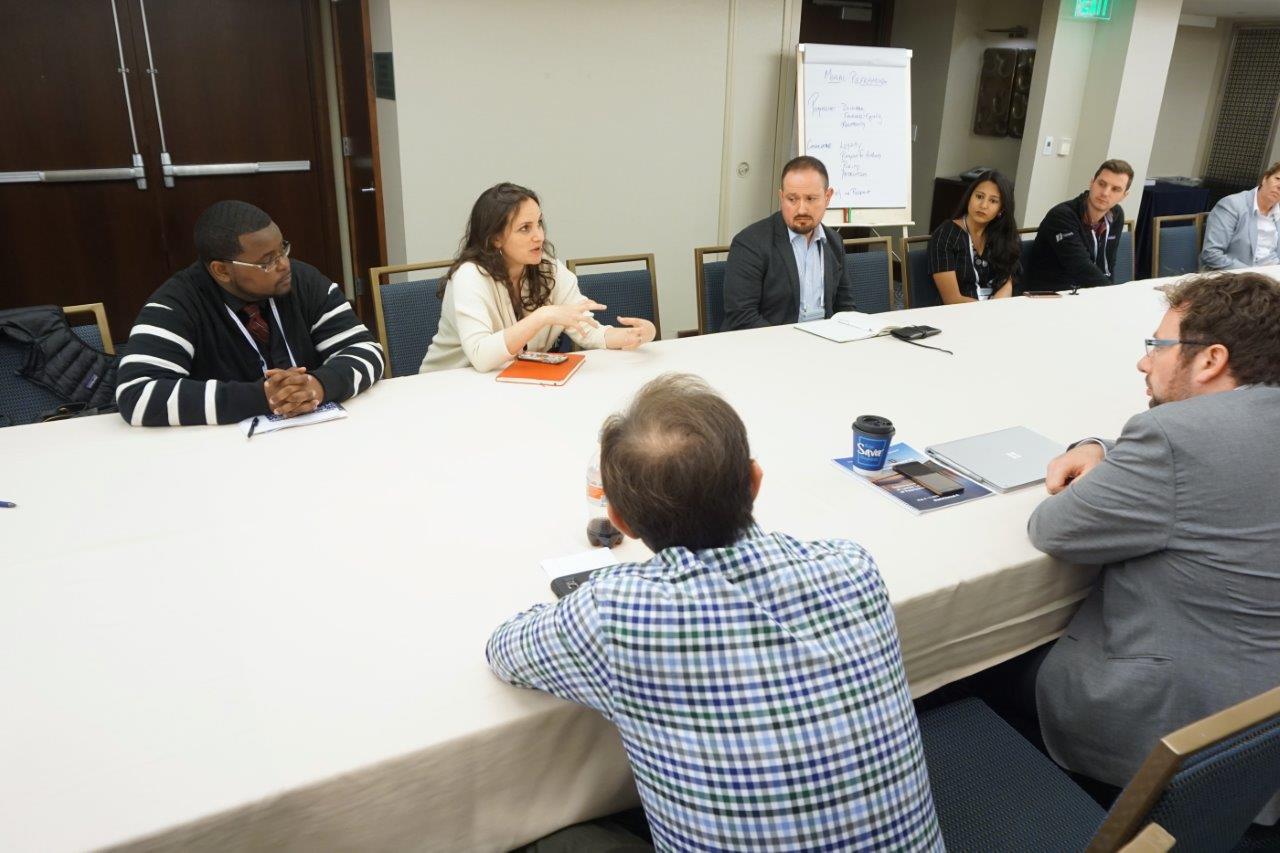 Attendees during a working session on housing clinics.