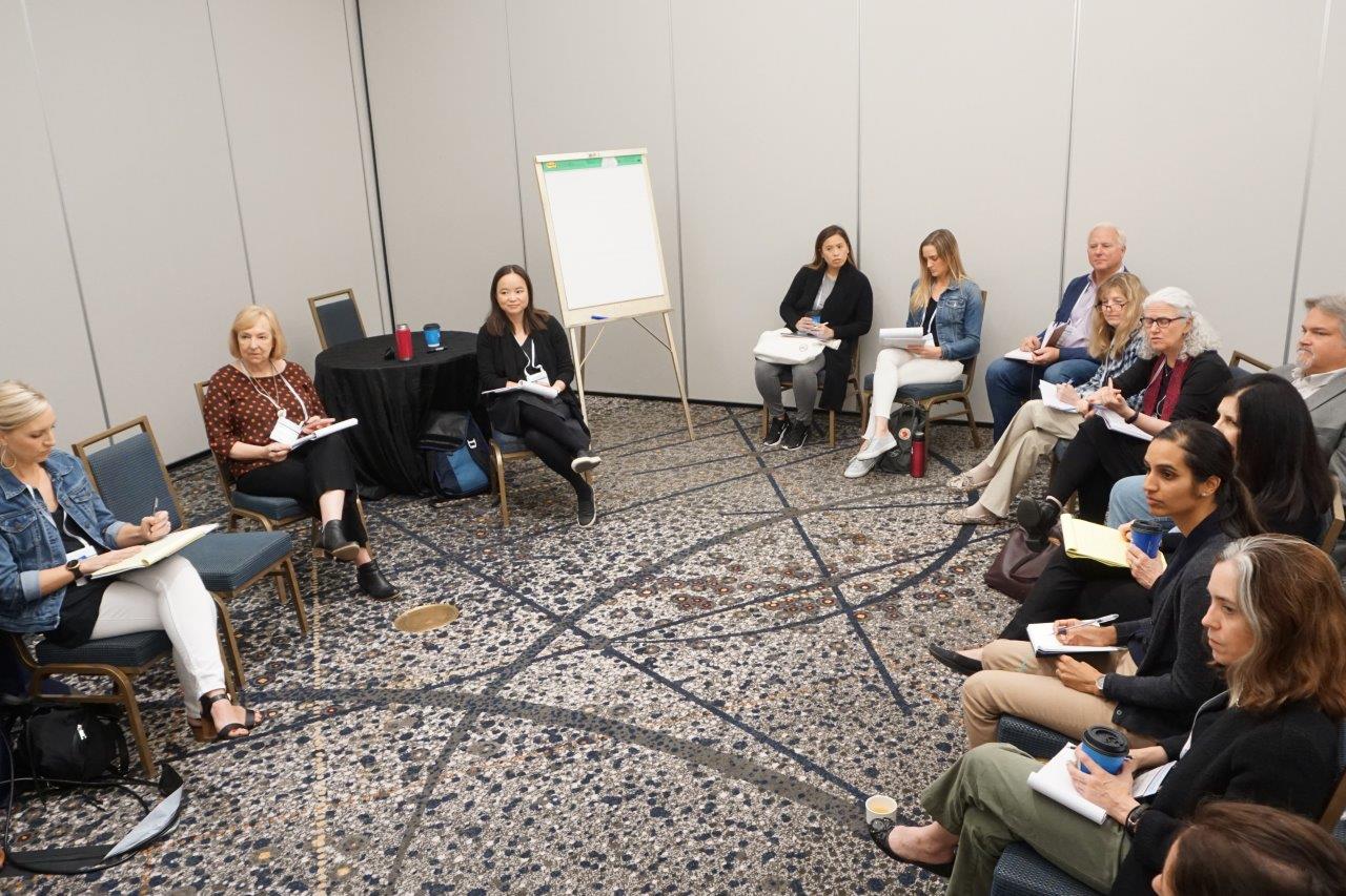 Working session participants discuss externships.