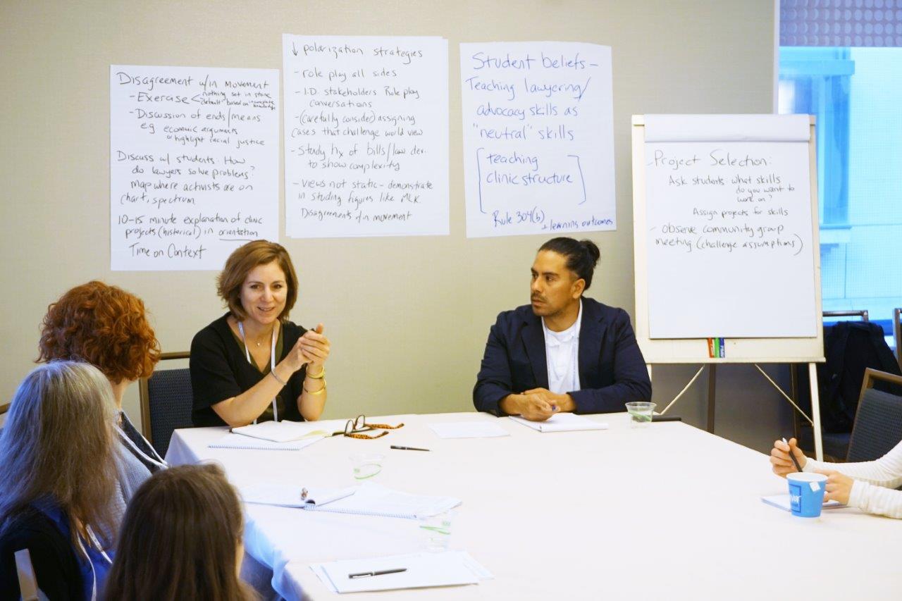 Attendees during a working session on policy and legislation focused legal clinics.