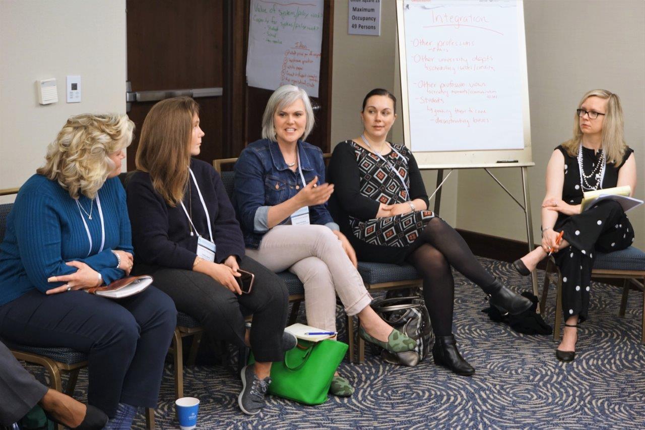 Participants in a working session on medical-legal partnerships.