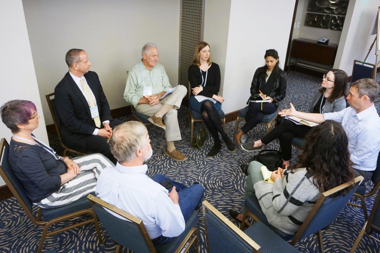 Attendees engage in a discussion during a working session on criminal law.