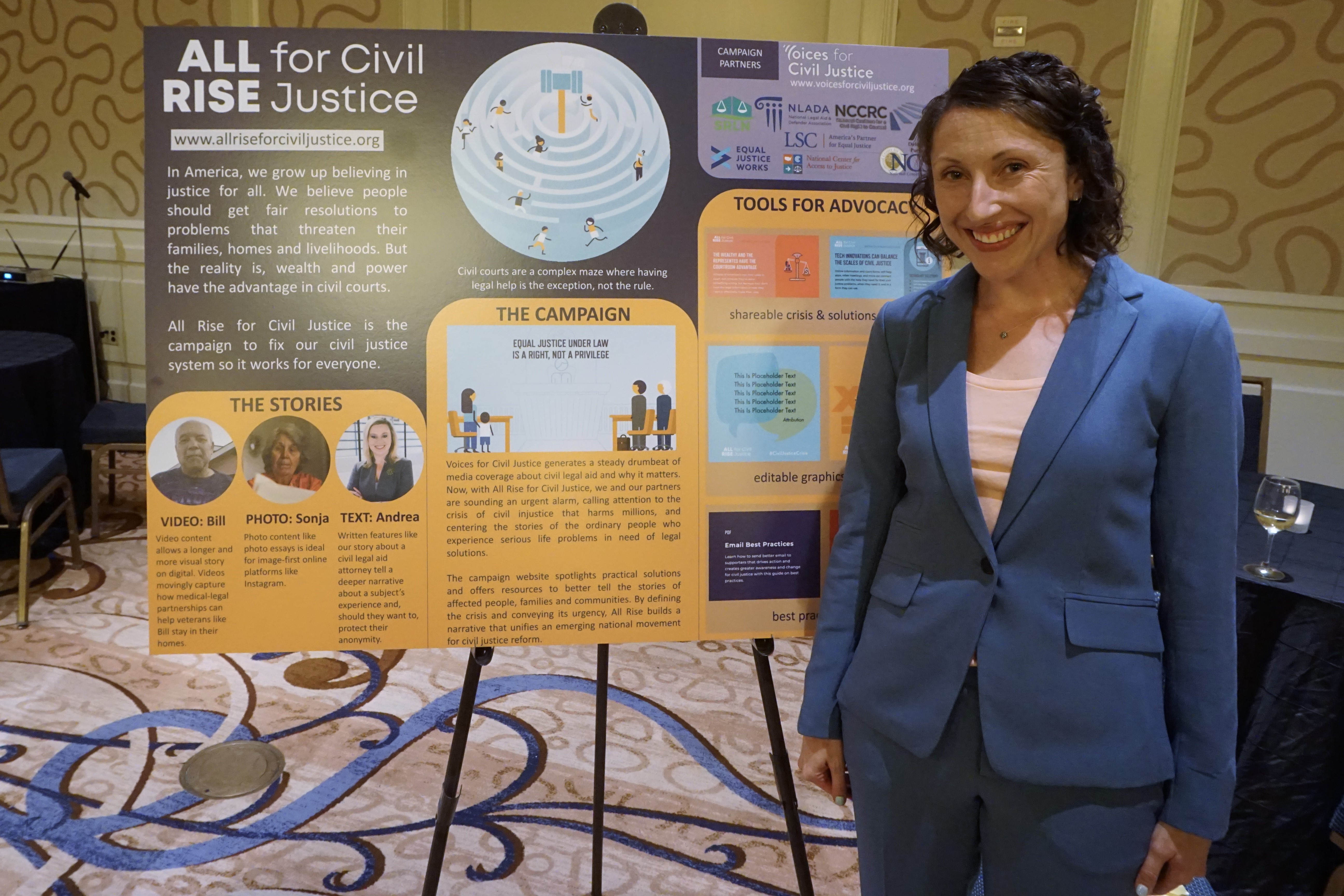 Esme Caramello (Harvard Law) displays her poster on "Effective Storytelling and Media Advocacy for Civil Justice System Reform."